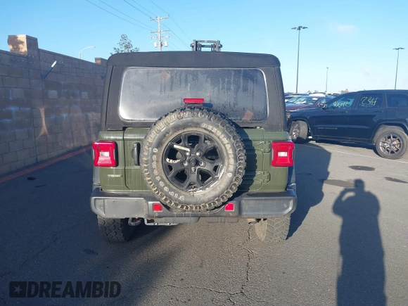 2023 Jeep Wrangler Unlimited Willys Sport with VIN 1C4HJXDM0PW515898, listed as a IAAI auction lot 41419267 with 10,964 mi miles and . Bid and sale history available at DreamBid. Image 17.