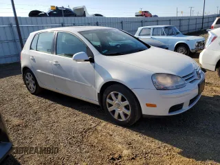 2007 Volkswagen Rabbit with VIN WVWDS71KX7W257923, listed as a Copart auction lot 41469135 with 147,476 mi miles and Salvage Title. Bid and sale history available at carsss.com. Image 4.