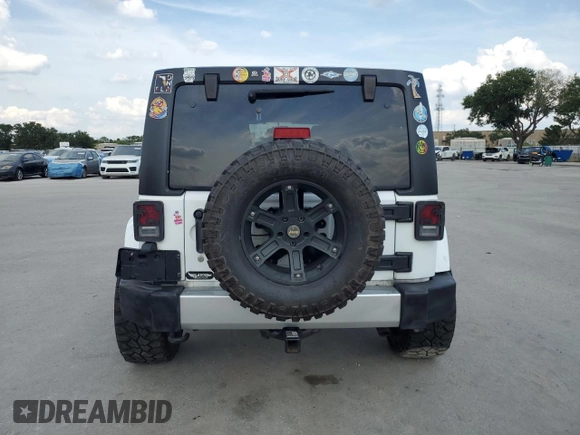 2013 Jeep Wrangler Unlimited Sahara with VIN 1C4BJWEG4DL536694, listed as a Copart auction lot 57714035 with 146,257 mi miles and Salvage title. Bid and sale history available at DreamBid. Image 6.