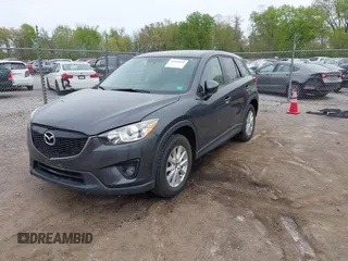 2014 Mazda CX-5 Touring with VIN JM3KE2CYXE0332517, listed as a IAAI auction lot 42109592 with 138,214 mi miles. Bid and sale history available at carsss.com. Image 17.