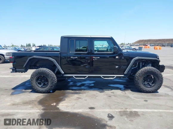 2020 Jeep Gladiator Sport S with VIN 1C6HJTAGXLL123540, listed as a IAAI auction lot 42453999 with 27,855 mi miles and . Bid and sale history available at DreamBid. Image 14.