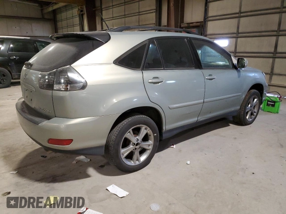 2006 Lexus RX 400h with VIN JTJHW31UX60022811, listed as a Copart auction lot 88362815 with 332,804 mi miles and Salvage Title. Bid and sale history available at DreamBid. Image 3.