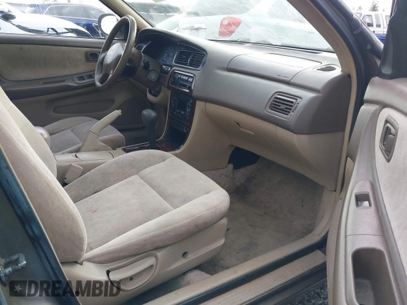 1999 Nissan Altima XE with VIN 1N4DL01D1XC210017, listed as a IAAI auction lot 41199544 with 297,917 mi miles. Bid and sale history available at carsss.com. Image 5.
