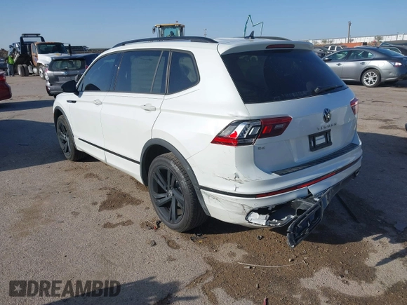2024 Volkswagen Tiguan SE R-Line Black with VIN 3VVCB7AX0RM099863, listed as a IAAI auction lot 41851884 with 14,091 mi miles and . Bid and sale history available at DreamBid. Image 3.