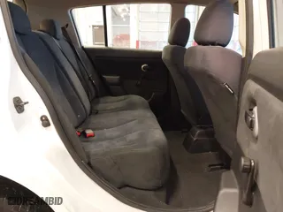 2009 Nissan Versa 1.8 S with VIN 3N1BC13E69L386083, listed as a IAAI auction lot 41717999 with 99,511 mi miles. Bid and sale history available at carsss.com. Image 8.