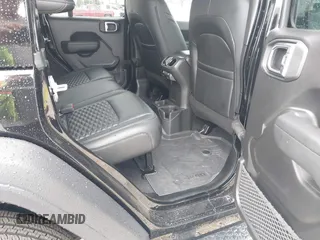 2025 Jeep Wrangler Sport S with VIN 1C4PJXDG9SW559915, listed as a IAAI auction lot 42653116 with 1,730 mi miles and . Bid and sale history available at DreamBid. Image 8.