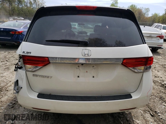 2014 Honda Odyssey LX with VIN 5FNRL5H27EB116435, listed as a Copart auction lot 52864825 with 94,643 mi miles and Salvage Title. Bid and sale history available at DreamBid. Image 6.