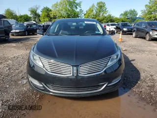 2014 Lincoln MKZ z VIN 3LN6L2J90ER802254, wystawiony jako Copart lot #58727025 z przebiegiem 172 297 mil mil oraz Szkoda całkowita • Salvage title. Historia ofert i sprzedaży dostępna na DreamBid. Obrazek 5.