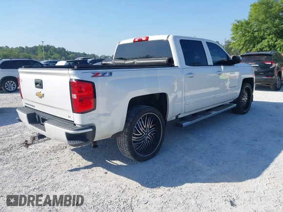 2017 Chevrolet Silverado 1500 LT with VIN 3GCUKREC4HG364108, listed as a IAAI auction lot 42050014 with 148,691 mi miles and . Bid and sale history available at DreamBid. Image 4.