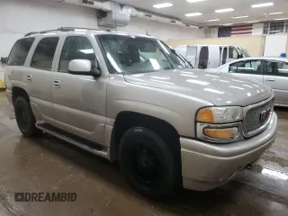2005 GMC Yukon Denali z VIN 1GKEK63U45J222600, wystawiony jako Copart lot #51329775 z przebiegiem 287 293 mil mil oraz Czysty tytuł • Clean title. Historia ofert i sprzedaży dostępna na DreamBid. Obrazek 4.