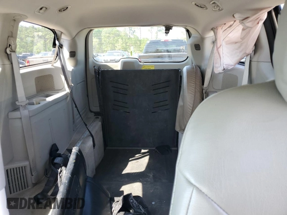 2013 Dodge Grand Caravan SXT with VIN 2C4RDGCG0DR639634, listed as a Copart auction lot 52548075 with 27,799 mi miles and Salvage Title. Bid and sale history available at DreamBid. Image 10.