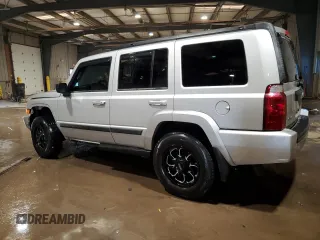 2009 Jeep Commander Sport z VIN 1J8HG48K09C526337, wystawiony jako Copart lot #89026135 z przebiegiem 194 514 mil mil oraz Szkoda całkowita • Salvage title. Historia ofert i sprzedaży dostępna na DreamBid. Obrazek 2.
