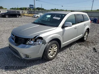 2014 Dodge Journey SXT z VIN 3C4PDCBG7ET126901, wystawiony jako Copart lot #52882625 z przebiegiem 176 923 mil mil oraz Szkoda całkowita • Salvage title. Historia ofert i sprzedaży dostępna na DreamBid. Obrazek 1.