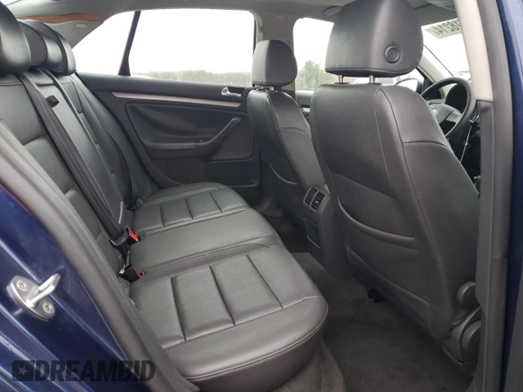 2006 Volkswagen Jetta z VIN 3VWRG81K06M785950, wystawiony jako Copart lot #87218214 z przebiegiem 129 955 mil mil oraz Szkoda całkowita • Salvage title. Historia ofert i sprzedaży dostępna na DreamBid. Obrazek 10.