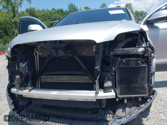 2013 Audi Q7 Premium Plus with VIN WA1LGBFE4DD012622, listed as a IAAI auction lot 42563953 with 186,190 mi miles and . Bid and sale history available at DreamBid. Image 6.