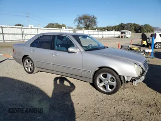 2002 Mercedes-Benz E-Class with VIN WDBJF65J82B478924, listed as a Copart auction lot 87767635 with 154,377 mi miles and Salvage Title. Bid and sale history available at carsss.com. Image 4.