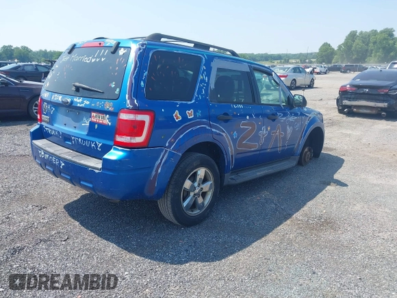 2011 Ford Escape XLT with VIN 1FMCU9D70BKA12908, listed as a IAAI auction lot 42425419 with 286,179 mi miles and . Bid and sale history available at DreamBid. Image 4.