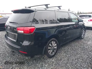 2016 Kia Sedona EX with VIN KNDMC5C11G6160910, listed as a IAAI auction lot 40905404 with 105,523 mi miles. Bid and sale history available at carsss.com. Image 4.