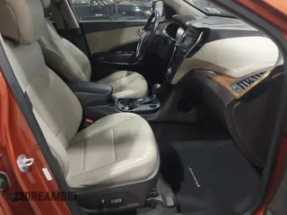 2013 Hyundai Santa Fe Sport z VIN 5XYZUDLA7DG042060, wystawiony jako IAAI lot #42467616 z przebiegiem 110 130 mil mil oraz . Historia ofert i sprzedaży dostępna na DreamBid. Obrazek 5.