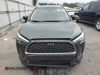 2023 Toyota Corolla Cross XLE с VIN 7MUDAAAG4PV038098, выставлен на аукционе Copart как лот 57906915 с пробегом 73 569 миль миль и Списание • Salvage title. История ставок и продаж доступна на DreamBid. Изображение 5.
