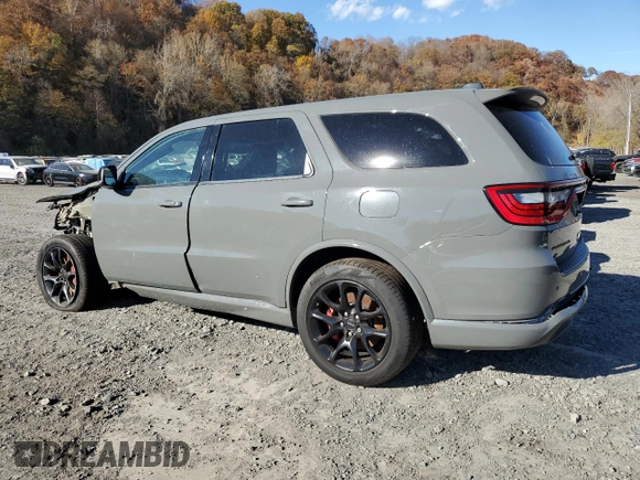 2023 Dodge Durango SRT Hellcat Premium z VIN 1C4SDJH92PC695631, wystawiony jako Copart lot #79218334 z przebiegiem Nie podano mil oraz Szkoda całkowita • Salvage title. Historia ofert i sprzedaży dostępna na DreamBid. Obrazek 2.