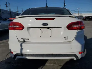 2016 Ford Focus SE with VIN 1FADP3F26GL336032, listed as a Copart auction lot 55963715 with 107,527 mi miles and Clean title. Bid and sale history available at DreamBid. Image 6.