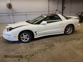 2000 Pontiac Firebird Formula z VIN 2G2FV22GXY2112840, wystawiony jako Copart lot #76244634 z przebiegiem 105 197 mil mil oraz Czysty tytuł • Clean title. Historia ofert i sprzedaży dostępna na DreamBid. Obrazek 1.