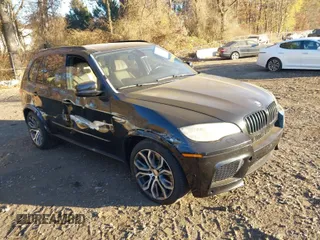2013 BMW X5 M with VIN 5YMGY0C55DLL15645, listed as a IAAI auction lot 40809601 with 67,956 mi miles. Bid and sale history available at carsss.com. Image 1.
