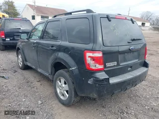 2011 Ford Escape XLT with VIN 1FMCU9D79BKB81857, listed as a IAAI auction lot 41736042 with 999,999 mi miles. Bid and sale history available at carsss.com. Image 3.