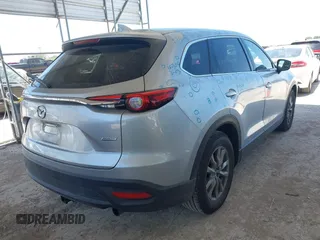 2018 Mazda CX-9 Touring with VIN JM3TCACY9J0224369, listed as a IAAI auction lot 42246792 with 80,169 mi miles and . Bid and sale history available at DreamBid. Image 4.