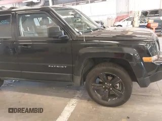 2014 Jeep Patriot Limited with VIN 1C4NJRCB4ED629085, listed as a IAAI auction lot 39414215 with 87,409 mi miles. Bid and sale history available at carsss.com. Image 16.