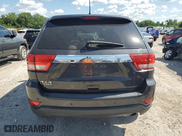 2011 Jeep Grand Cherokee Laredo z VIN 1J4RR4GG9BC614502, wystawiony jako Copart lot #64179275 z przebiegiem 189 284 mil mil oraz Czysty tytuł • Clean title. Historia ofert i sprzedaży dostępna na DreamBid. Obrazek 6.