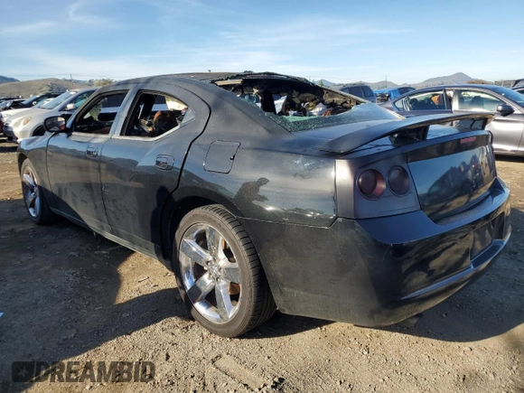2009 Dodge Charger R/T with VIN 2B3LA53T99H553074, listed as a Copart auction lot 87439734 with 0 mi miles and Salvage Title. Bid and sale history available at carsss.com. Image 2.