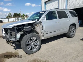 2015 Chevrolet Tahoe LTZ z VIN 1GNSKCKC8FR686358, wystawiony jako Copart lot #57967905 z przebiegiem 158 571 mil mil oraz Szkoda całkowita • Salvage title. Historia ofert i sprzedaży dostępna na DreamBid. Obrazek 1.