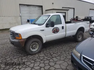 1999 Ford F-250 XL z VIN 1FTNF21L9XEC03863, wystawiony jako Copart lot #87954105 z przebiegiem 336 221 mil mil oraz Czysty tytuł • Clean title. Historia ofert i sprzedaży dostępna na DreamBid. Obrazek 1.