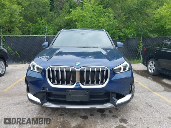 2025 BMW X1 xDrive28i z VIN WBX73EF07S5228273, wystawiony jako IAAI lot #42436863 z przebiegiem 6 845 mil mil oraz . Historia ofert i sprzedaży dostępna na DreamBid. Obrazek 12.