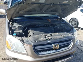 2004 Honda Pilot EX with VIN 2HKYF18574H578967, listed as a IAAI auction lot 41622715 with 150,803 mi miles. Bid and sale history available at carsss.com. Image 10.