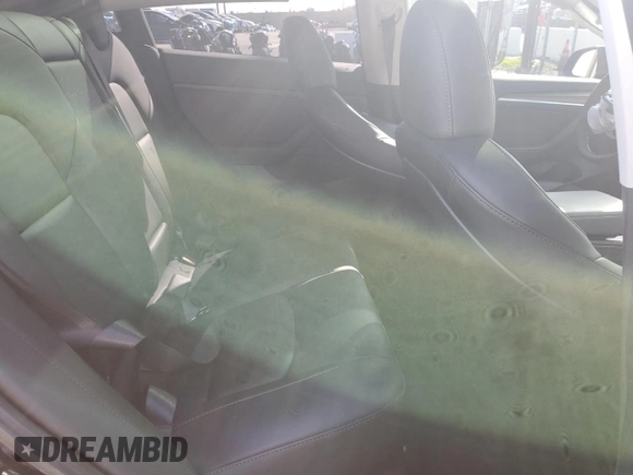 2023 Tesla Model 3 z VIN 5YJ3E1EA6PF546643, wystawiony jako Copart lot #49953555 z przebiegiem 29 549 mil mil oraz Szkoda całkowita • Salvage title. Historia ofert i sprzedaży dostępna na DreamBid. Obrazek 10.