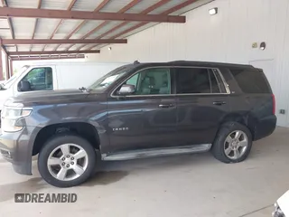 2015 Chevrolet Tahoe LT with VIN 1GNSCBKC5FR105437, listed as a IAAI auction lot 42052084 with 348,093 mi miles and . Bid and sale history available at DreamBid. Image 14.