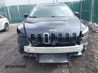 2016 Jeep Cherokee Limited with VIN 1C4PJMDB2GW181432, listed as a IAAI auction lot 41675868 with 106,979 mi miles. Bid and sale history available at carsss.com. Image 6.