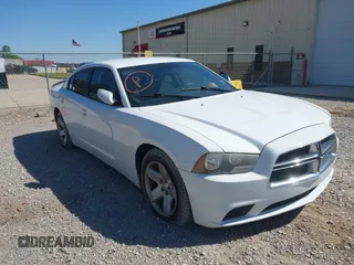 2012 Dodge Charger SE with VIN 2C3CDXBG1CH211300, listed as a IAAI auction lot 42049480 with 156,303 mi miles and . Bid and sale history available at DreamBid. Image 6.