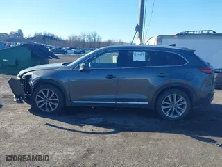 2016 Mazda CX-9 Signature with VIN JM3TCBEY3G0104689, listed as a IAAI auction lot 41257053 with 116,486 mi miles. Bid and sale history available at carsss.com. Image 14.