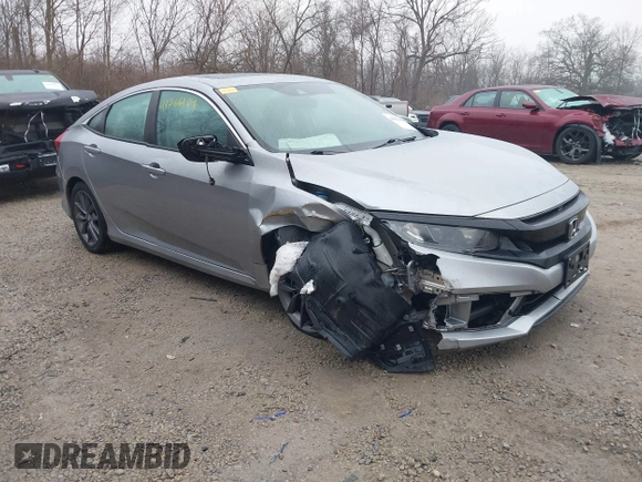 2021 Honda Civic Sedan EX-L with VIN 19XFC1F77ME011926, listed as a IAAI auction lot 41561104 with 76,163 mi miles. Bid and sale history available at carsss.com. Image 1.