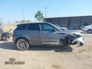 2015 Land Rover Range Rover Evoque Pure Plus z VIN SALVP2BG8FH047528, wystawiony jako IAAI lot #42466907 z przebiegiem 100 941 mil mil oraz . Historia ofert i sprzedaży dostępna na DreamBid. Obrazek 13.