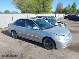2001 Honda Civic EX with VIN 2HGES26771H512949, listed as a IAAI auction lot 42020043 with 299,833 mi miles. Bid and sale history available at carsss.com. Image 1.