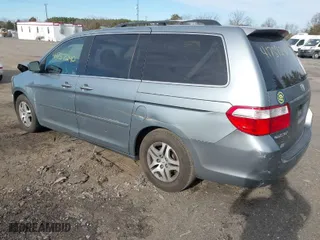 2007 Honda Odyssey EX-L with VIN 5FNRL38627B017130, listed as a IAAI auction lot 41757240 with 205,137 mi miles. Bid and sale history available at carsss.com. Image 3.