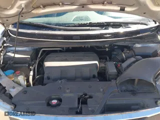 2013 Honda Odyssey Touring with VIN 5FNRL5H93DB076463, listed as a IAAI auction lot 41819994 with 188,911 mi miles. Bid and sale history available at carsss.com. Image 10.