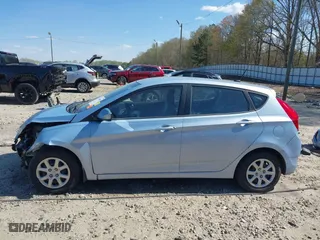 2014 Hyundai Accent GS with VIN KMHCT5AE1EU187112, listed as a IAAI auction lot 41894869 with 100,640 mi miles. Bid and sale history available at carsss.com. Image 15.