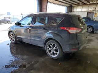 2014 Ford Escape Titanium with VIN 1FMCU0JX2EUD08165, listed as a Copart auction lot 89318205 with 134,721 mi miles and Salvage Title. Bid and sale history available at carsss.com. Image 2.