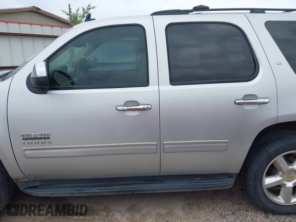 2011 Chevrolet Tahoe LT with VIN 1GNSCBE05BR190310, listed as a IAAI auction lot 42243623 with 249,453 mi miles and . Bid and sale history available at DreamBid. Image 14.